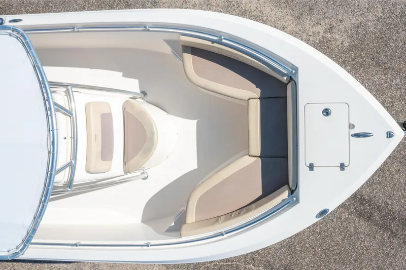 Slide: The Image of Overhead view of 2017 Cobia 220 Center Console boat's bow seating area. - 6