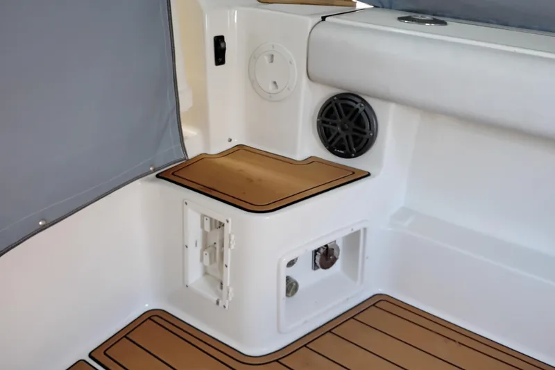 Slide: The Image of Interior of 1997 Tiara 3700 Open boat with wood accents and speaker. - 11