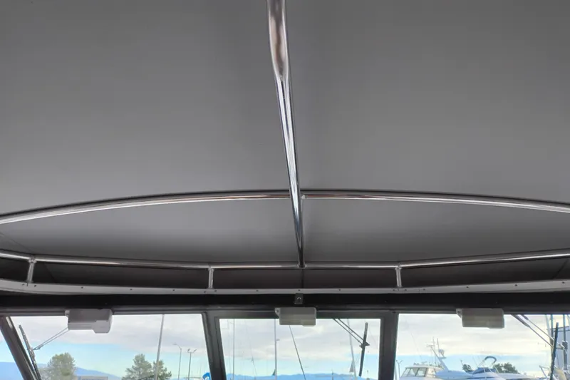 Slide: The Image of Interior view of 1997 Tiara 3700 Open boat's ceiling with metal framework. - 15