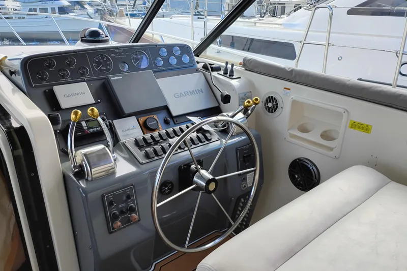 Slide: The Image of Cockpit of 1997 Tiara 3700 Open yacht with Garmin navigation system. - 19