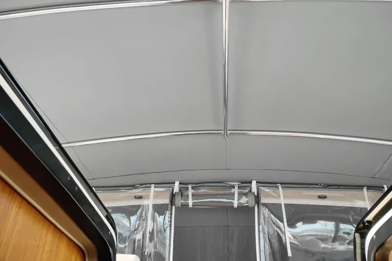 Slide: The Image of Interior view of 1997 Tiara 3700 Open boat canopy with metal supports. - 29