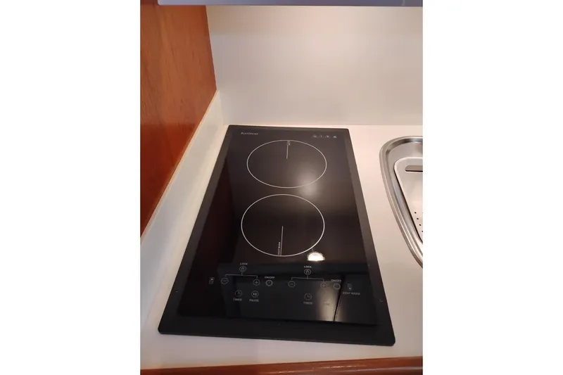 Slide: The Image of Induction cooktop in 1997 Tiara 3700 Open yacht kitchen. - 40