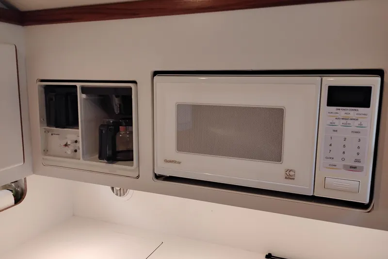 Slide: The Image of 1997 Tiara 3700 Open kitchen with built-in microwave and coffee maker. - 41