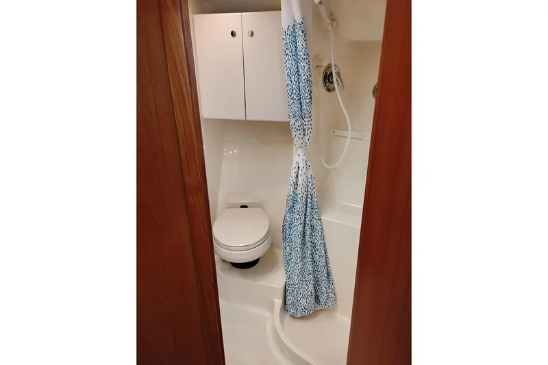 Slide: The Image of Bathroom interior of 1997 Tiara 3700 Open yacht with shower and toilet. - 52