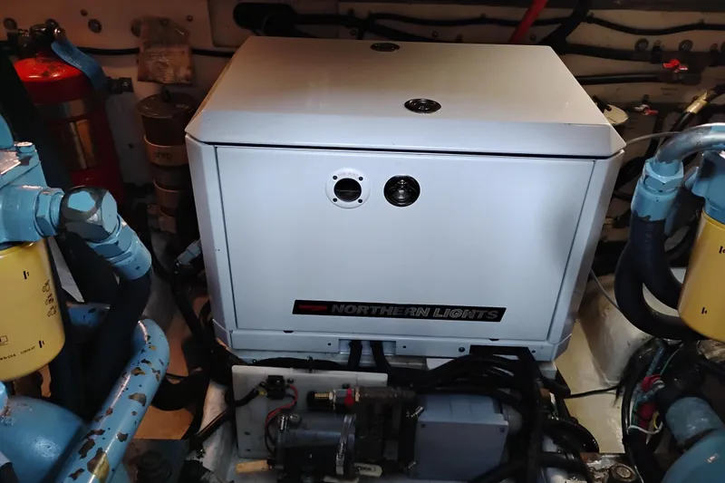 Slide: The Image of Engine room of a 1997 Tiara 3700 Open with Northern Lights generator. - 55