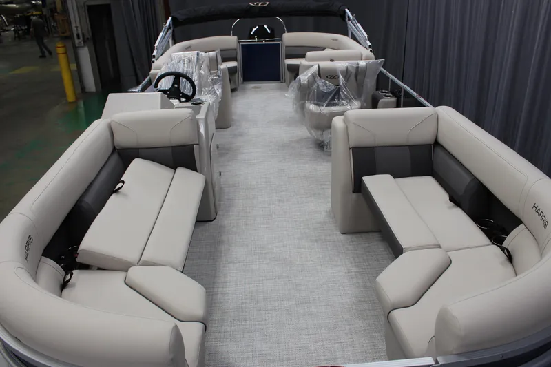 Slide: The Image of 2023 Harris Cruiser 250 pontoon boat interior with spacious seating and modern design. - 10