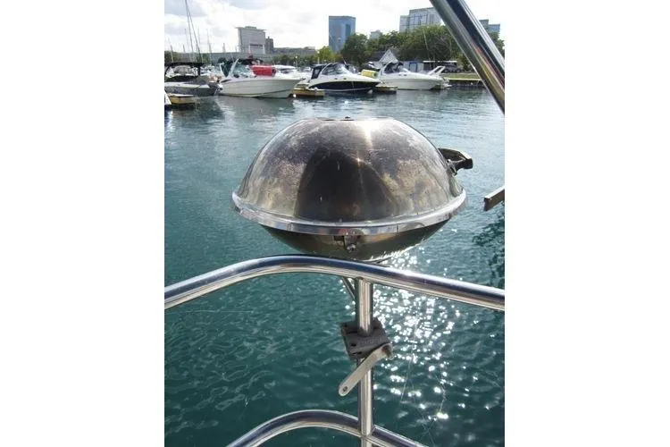 Slide: The Image of Stainless steel boat grill on CAL 28, 1988, with marina view. - 20