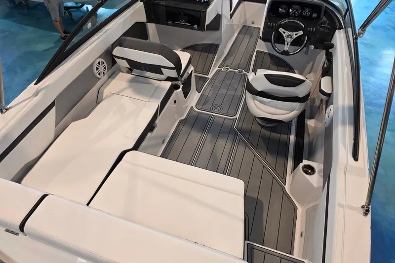 Slide: The Image of 2024 Monterey M-205 boat interior with sleek seating and modern dashboard design. - 5