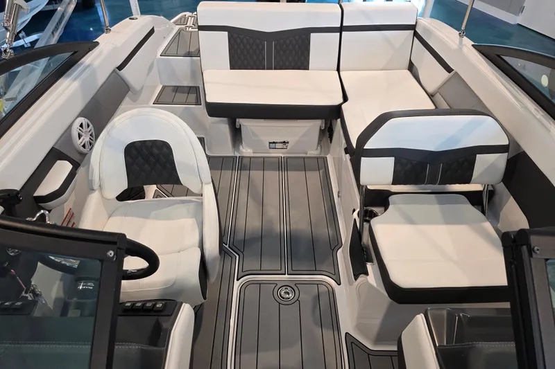 Slide: The Image of 2024 Monterey M-205 boat interior with white and black seating, modern design. - 9