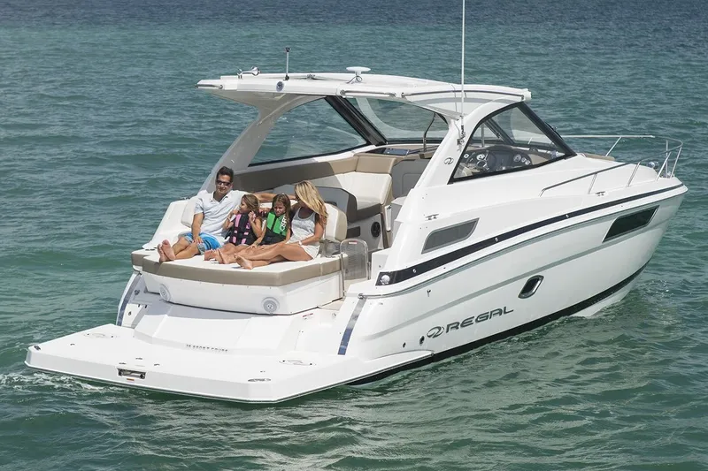 Slide: The Image of Manufacturer Provided Image: 2017 Regal 35 Sport Coupe boat with family relaxing on deck in open water. - 4