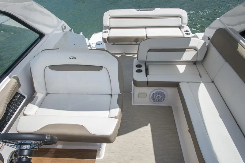 Slide: The Image of Manufacturer Provided Image: 2017 Regal 35 Sport Coupe boat interior with white and beige seating. - 7