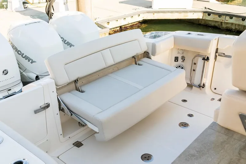 Slide: The Image of Triple Mercury outboard engines on a 2019 Boston Whaler 350 Realm boat. - 13
