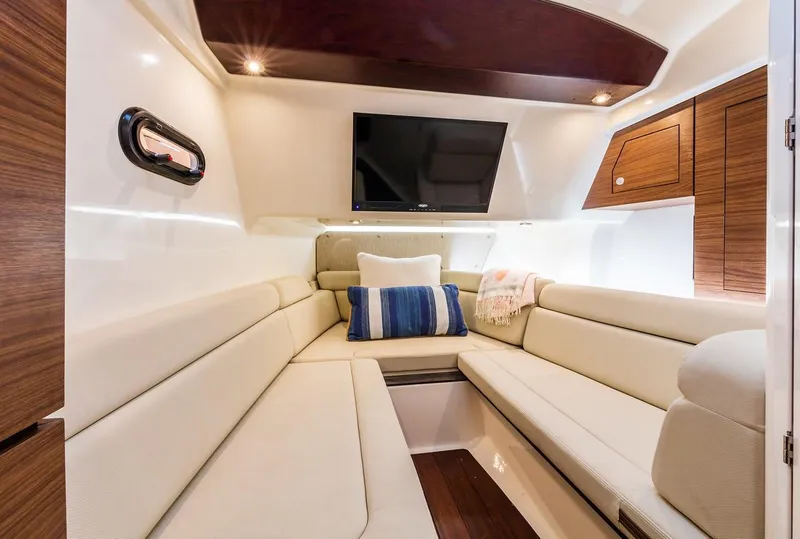 Slide: The Image of Close-up of 2019 Boston Whaler 350 Realm boat propeller in a storage area. - 15