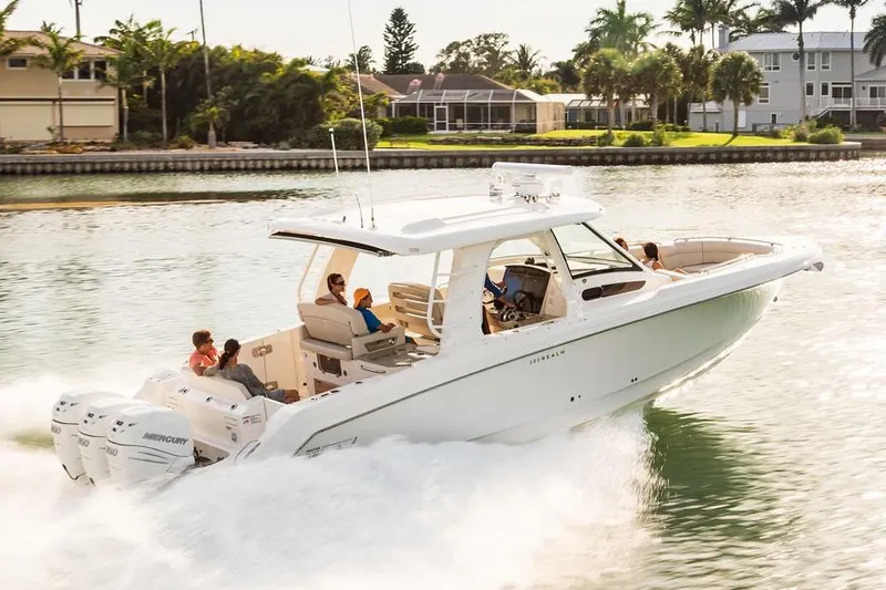 Slide: The Image of 2019 Boston Whaler 350 Realm boat with registration OH 9910 FY in storage. - 2