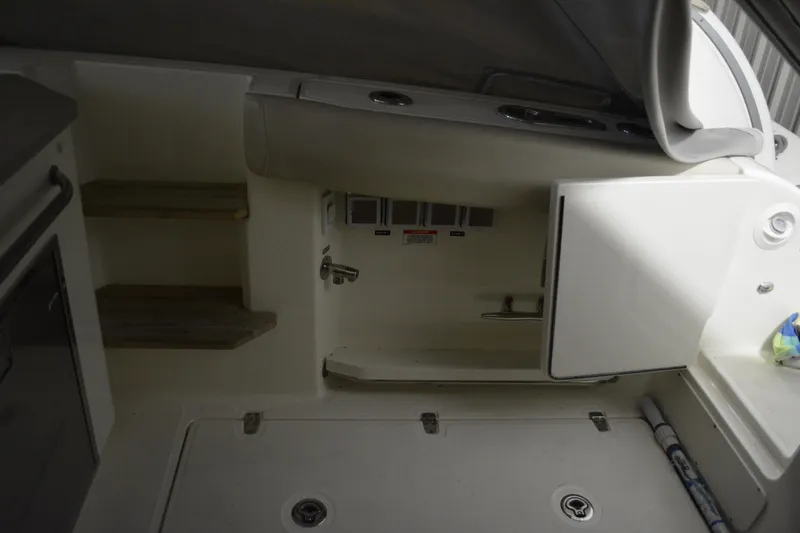 Slide: The Image of Stainless steel hatch on 2019 Boston Whaler 350 Realm boat interior. - 25