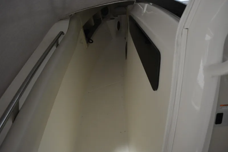 Slide: The Image of Interior of 2019 Boston Whaler 350 Realm boat with seating and cabin area. - 35
