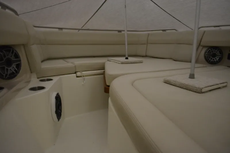 Slide: The Image of 2019 Boston Whaler 350 Realm interior with beige seating and speaker system. - 37