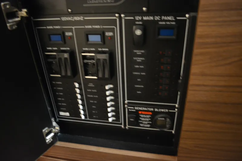 Slide: The Image of Interior seating of 2019 Boston Whaler 350 Realm boat with cushion and window. - 49