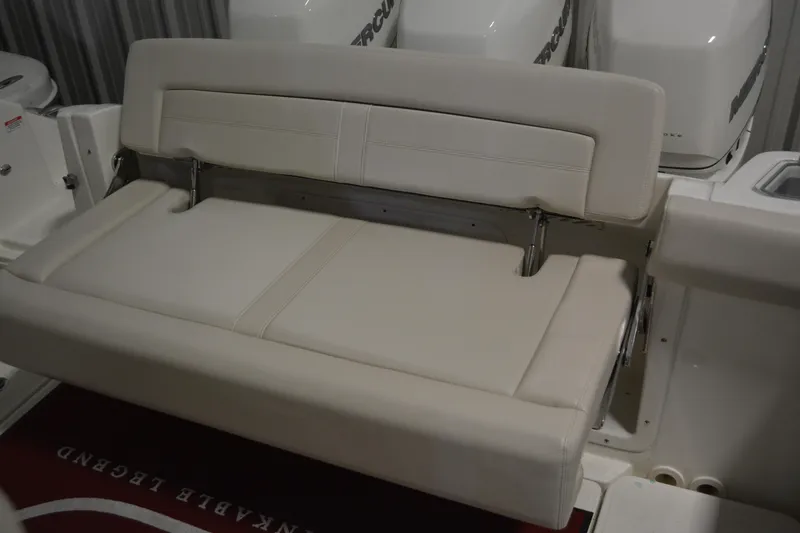 Slide: The Image of 2019 Boston Whaler 350 Realm boat with foldable beige seating. - 73