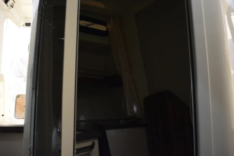 Slide: The Image of Interior cabin view of a 2019 Boston Whaler 350 Realm boat. - 87