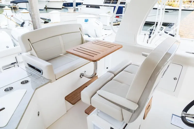 Slide: The Image of Close-up of 2019 Boston Whaler 350 Realm hull and trim tabs. - 9