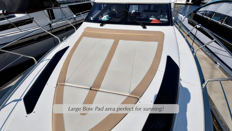 Slide: The Image of 2013 Marquis 500 Sport Bridge with large bow pad for sunning. - 2