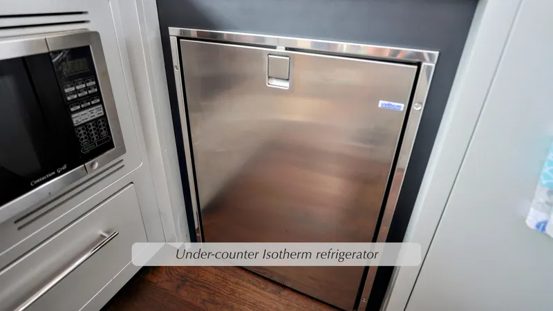 Slide: The Image of Under-counter Isotherm refrigerator in 2013 Marquis 500 Sport Bridge yacht kitchen. - 23