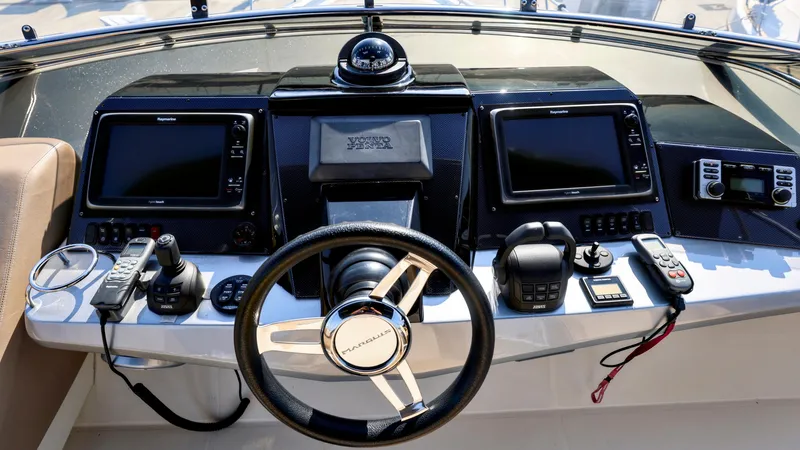 Slide: The Image of Control panel of 2013 Marquis 500 Sport Bridge yacht with navigation equipment. - 6