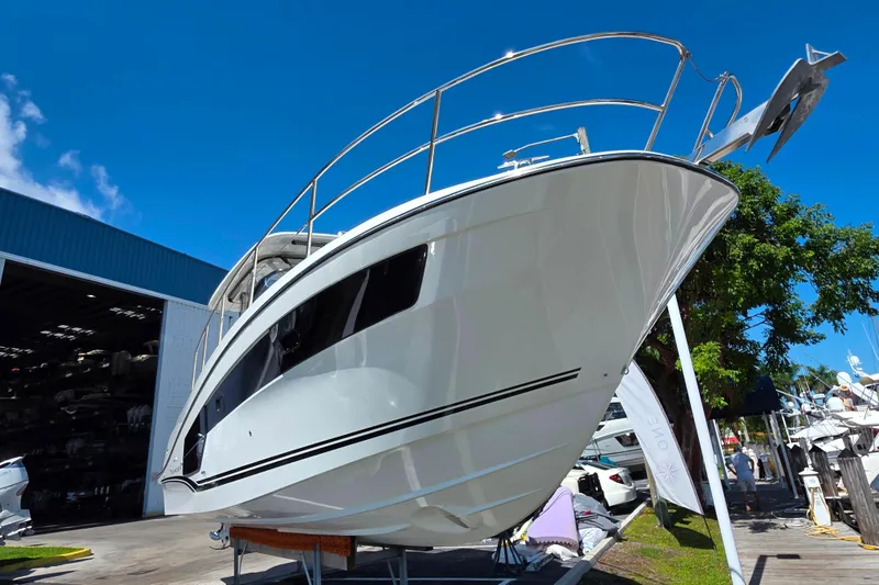 Slide: The Image of 2021 Jeanneau Leader 10.5 WA boat on display, featuring sleek design and Yamaha engines. - 0