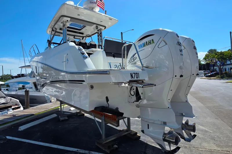 Slide: The Image of Twin Yamaha V8 outboard engines on a 2021 Jeanneau Leader 10.5 WA boat. - 15