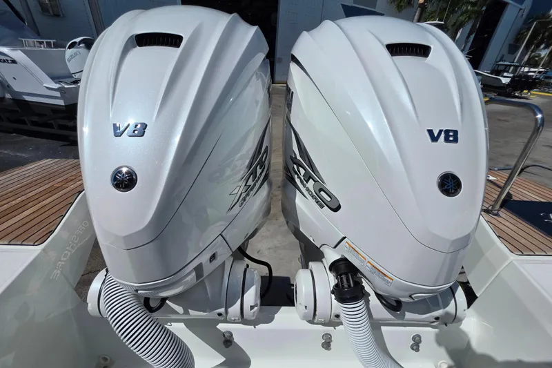 Slide: The Image of 2021 Jeanneau Leader 10.5 WA boat interior with "Lady J" mat, stainless steel railings. - 16