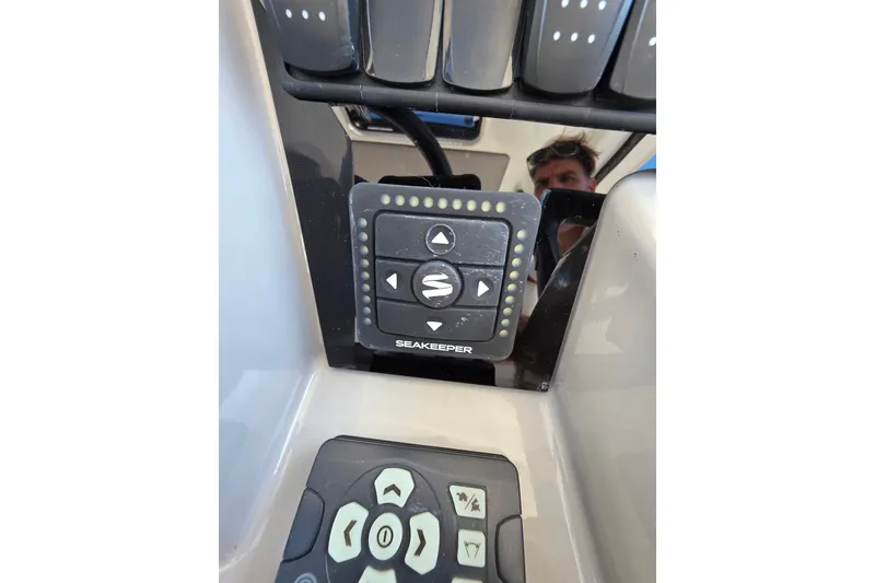 Slide: The Image of Cockpit of 2021 Jeanneau Leader 10.5 WA with Garmin navigation system and controls. - 29