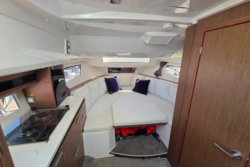 Slide: The Image of Bathroom interior of 2021 Jeanneau Leader 10.5 WA boat, featuring sink and toilet. - 42