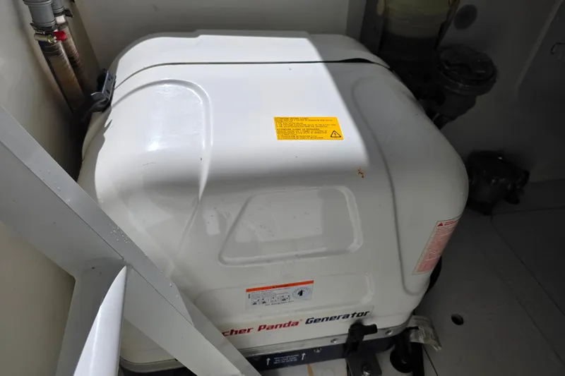 Slide: The Image of 2021 Jeanneau Leader 10.5 WA engine compartment with storage and equipment. - 46