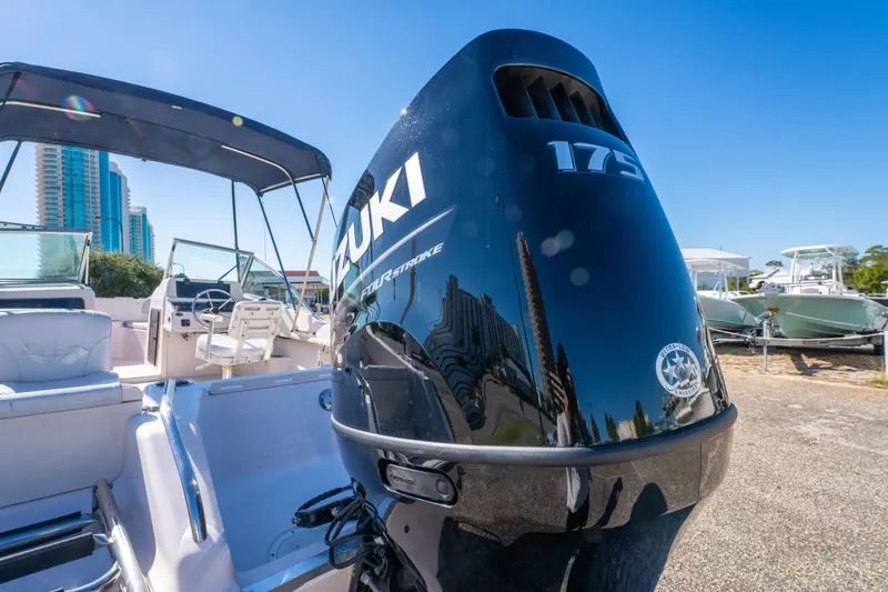 Slide: The Image of 1999 Grady-White Tournament 192 boat with Suzuki 175 outboard motor, sunny day. - 9