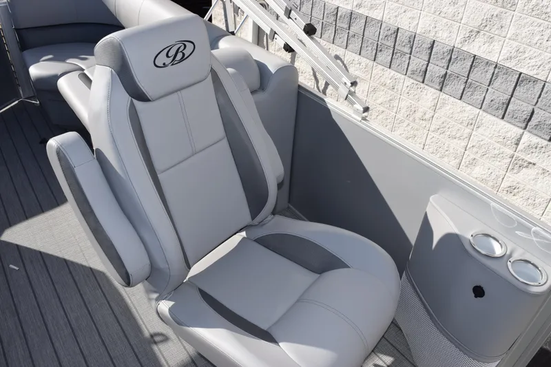 Slide: The Image of Luxurious seating on 2026 Bentley Pontoons Legacy 243 Navigator with cup holders. - 11