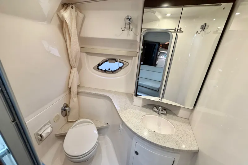 Slide: The Image of Luxurious bathroom in 2017 Regal 35 Sport Coupe yacht with modern fixtures and elegant design. - 11