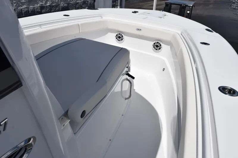 Slide: The Image of 2026 Sea Hunt Gamefish 27 Coffin Box boat interior with seating and speakers. - 11
