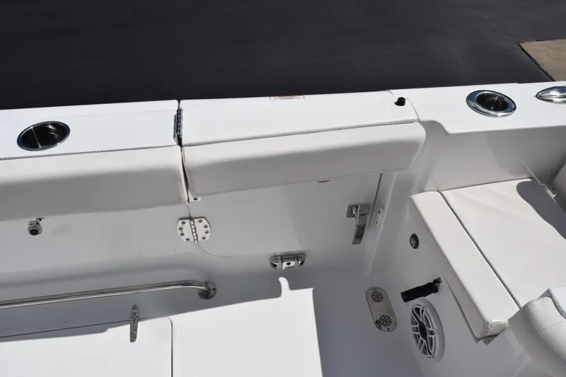 Slide: The Image of 2026 Sea Hunt Gamefish 27 Coffin Box boat interior with seating and cup holders. - 18