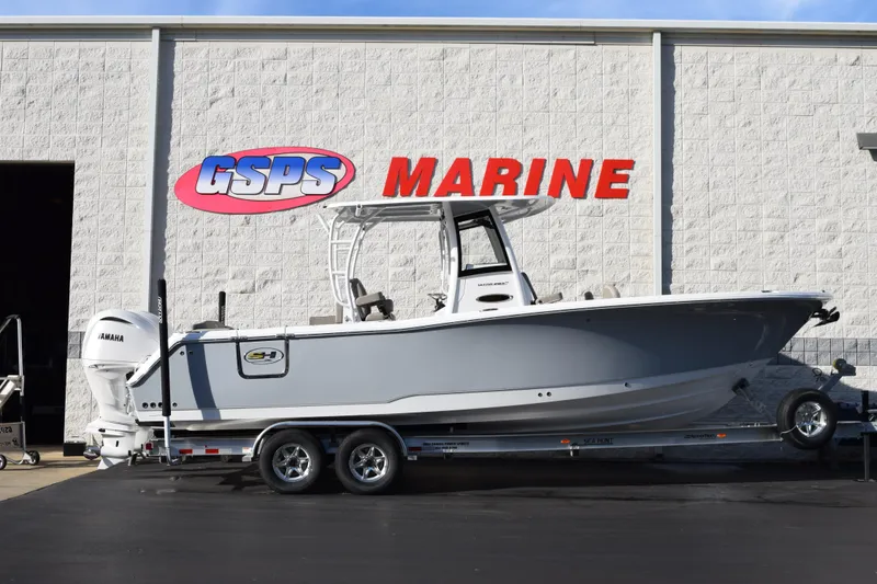 The Image of 2026 Sea Hunt Ultra 285 SE boat on trailer at GSPS Marine dealership. - 1