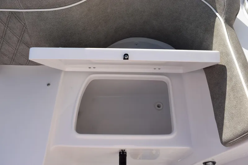 Slide: The Image of Open storage compartment on 2026 Sea Hunt Ultra 285 SE boat. - 29