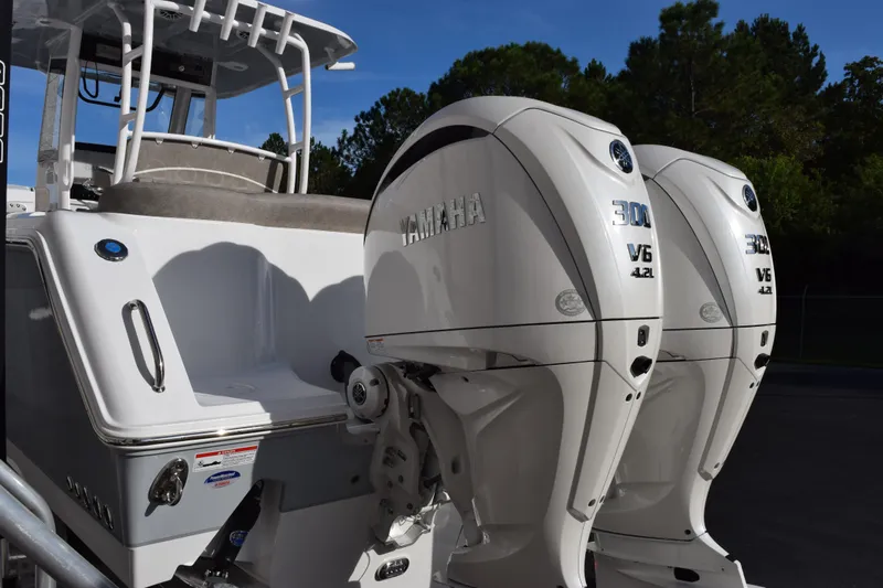 Slide: The Image of 2026 Sea Hunt Ultra 285 SE with twin Yamaha 300 V6 outboard engines. - 6