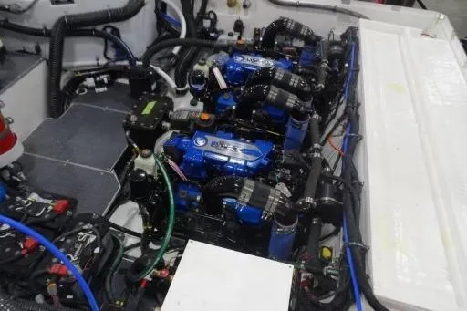 Slide: The Image of Engine compartment of a 2021 Formula 380 Super Sport Crossover I/O boat. - 13