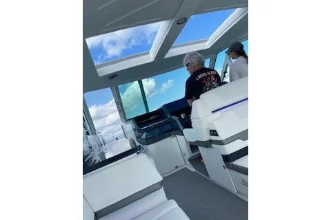 Slide: The Image of 2021 Formula 380 Super Sport Crossover I/O interior with luxurious seating and modern design. - 5