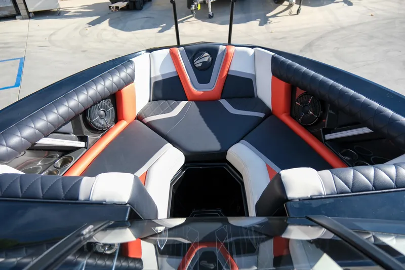 Slide: The Image of 2021 Tigé 21ZX boat interior with stylish seating and modern design. - 13