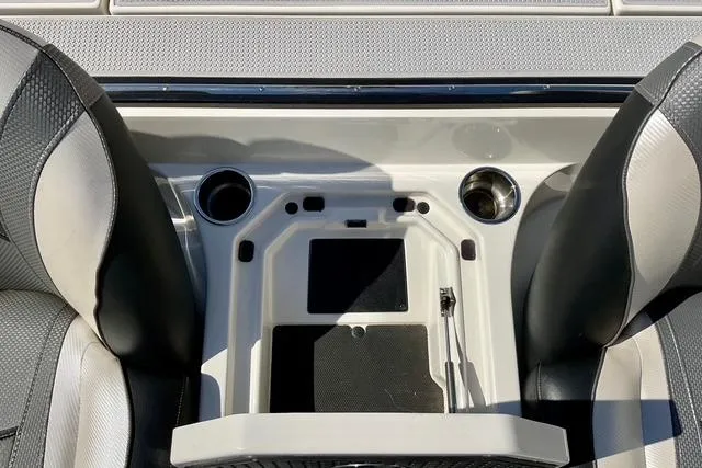 Slide: The Image of 2020 Ranger Z521L Intracoastal boat interior with cup holders and seating. - 14