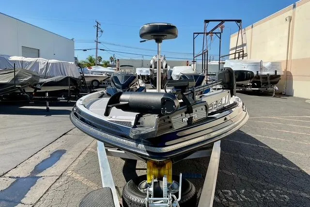 Slide: The Image of 2020 Ranger Z521L Intracoastal boat on trailer in outdoor storage area. - 16