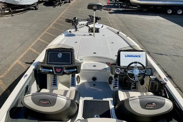 Slide: The Image of 2020 Ranger Z521L Intracoastal boat interior with dual consoles and advanced navigation systems. - 26
