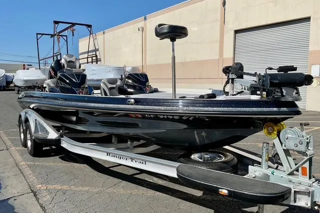 Slide: The Image of 2020 Ranger Z521L Intracoastal boat on trailer, parked outdoors. - 6