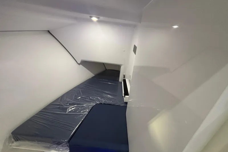 Slide: The Image of Luxurious interior of 2026 Southport 33 DC boat with modern amenities and sleek design. - 20